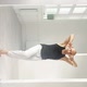 Fit Man Performs Elements of Modern Dance From a White Studio - VideoHive Item for Sale