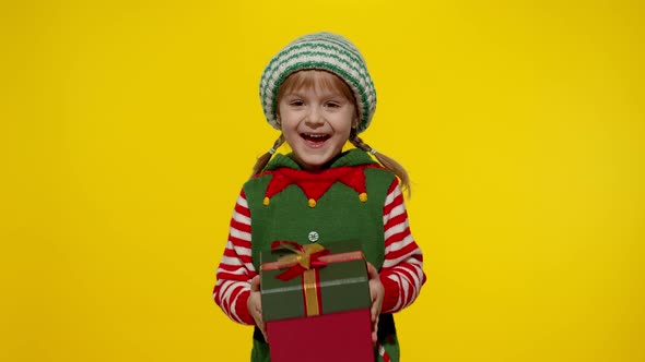 Kid Girl in Christmas Elf Santa Helper Costume Getting Receiving Present Gift Box