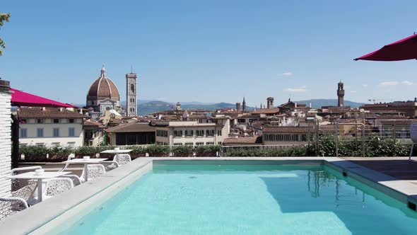 Luxury Hotel Rooftop Pool with View of Florence City and Cathedral Dome, Aerial Flight with Copy Spa