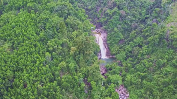 Drone Shows Mountain River Among Jungle in Highland