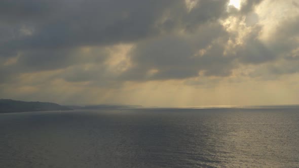 Beautiful Sunset at Sea with Cloudy Sky