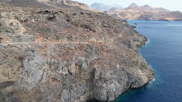 Aerial drone shot tracking around to reveal the famous landmark.