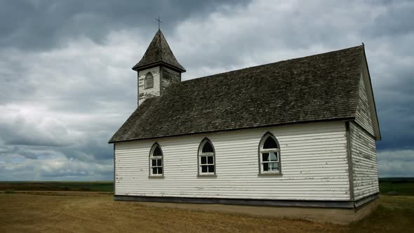 Old Wooden Church With Passing Clouds