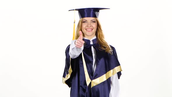 Graduate Showing Thumbs Up and Winking. White