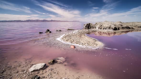 Time lapse over the Great Salt Lake with pink algae