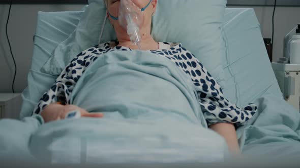 Retired Woman with Oxygen Tube Against Respiratory Problem