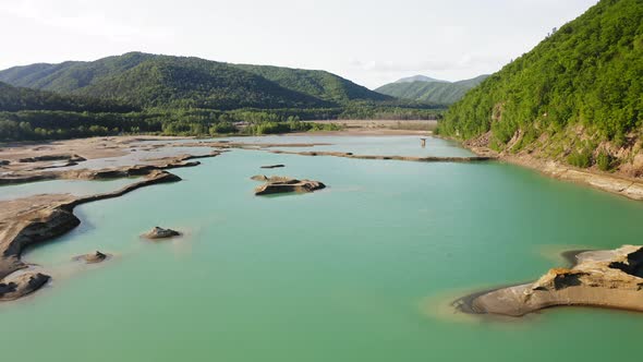 Drone View of the Turquoise Lake Formed As a Result of Mining Waste