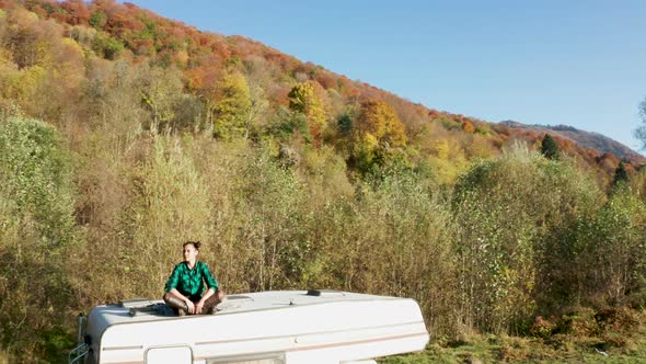 Drone Footage of Beautiful Young Woman Admiring the Scenary