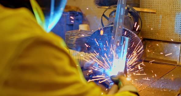 Closeup Sparks are Flying When Welding Metal