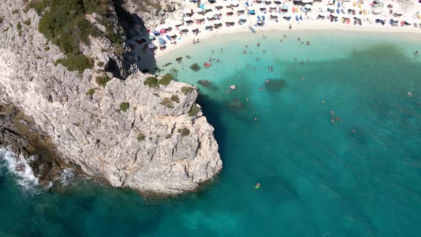 Aerial View of Lefkas Beach at Sunny Summer Day People Sunbathing Greece Vacation