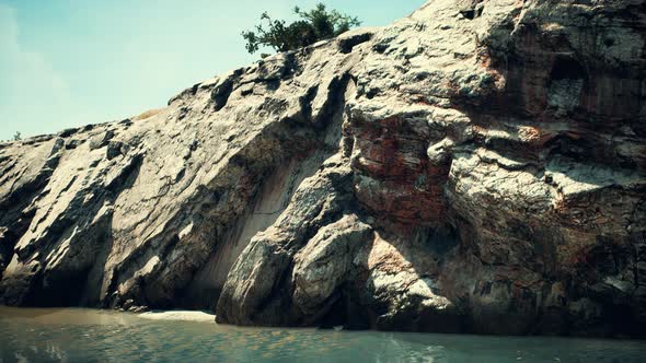 Coastal View of a Sand Beach with Cliffs alt