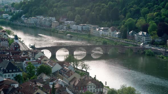 Heidelberg medieval bridge over neckar Alte Brücke famous landmark with boats