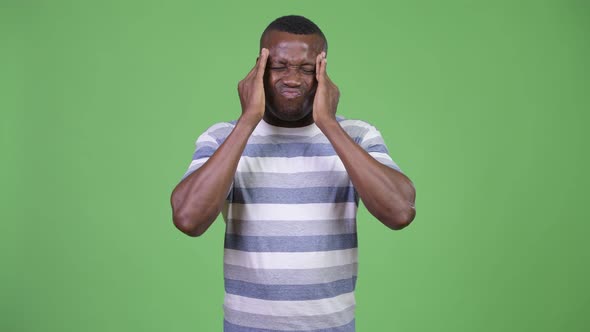 Young African Man Having Headache