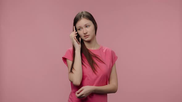 Portrait of Fashion Model Talking on Her Smartphone