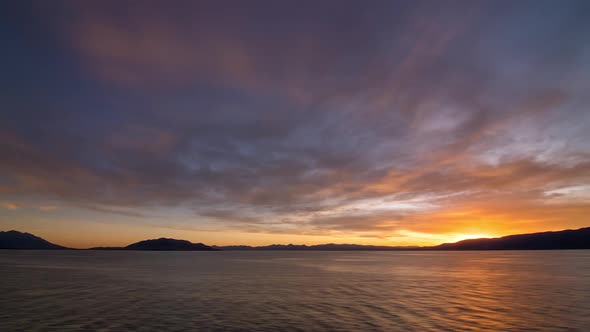 Colorful sunset over Utah Lake in time lapse