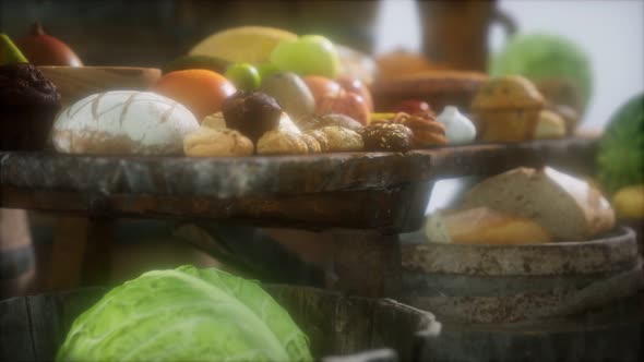 Food Table with Wine Barrels and Some Fruits Vegetables and Bread