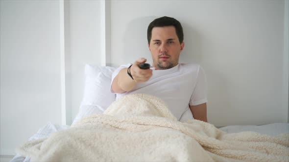 Portrait of a Man Quietly Lying in Bed.
