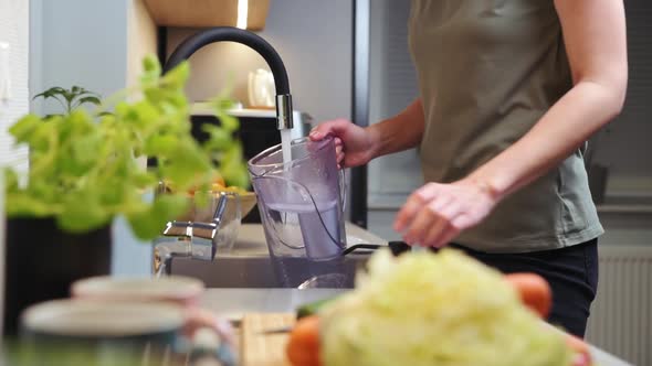 Woman Pouring Water Filter Jag