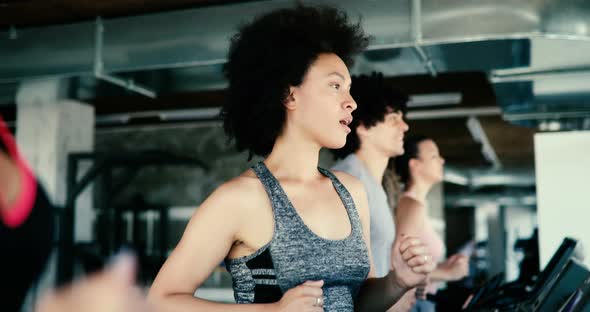 Picture of People Running on Treadmill in Gym