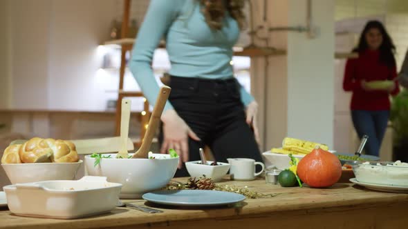 Millennial adult friends celebrating Thanksgiving together at home