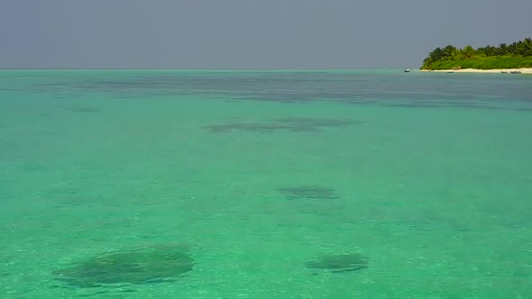 Aerial drone panorama of coastline beach time by ocean with sand background