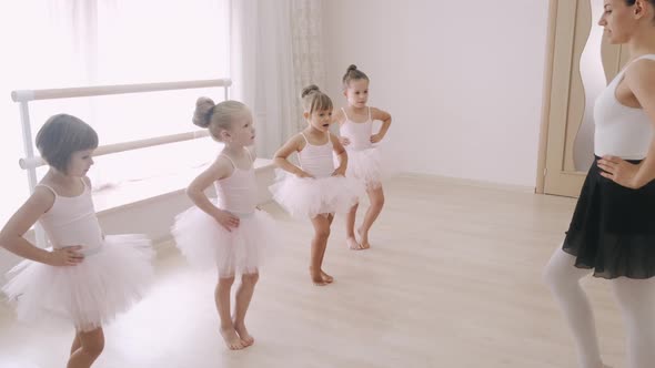 Young Students Ballerinas in Choreography Class of Ballet School