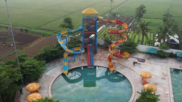 Aerial view of outdoor swimming pool in hotel resort for vacation travel at Bekasi