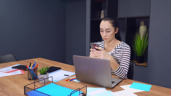 Employee in Startup Company Use Smartphone