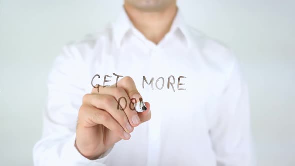 Get More Done Businessman Writing on Glass