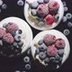 Delicious Mini Pavlova Meringue Desserts Served with Frozen Frosty Berries - VideoHive Item for Sale