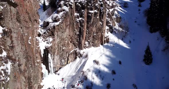 Freezing Waterfall in the Snowy Mountains