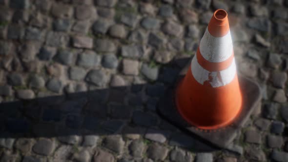 Orange and White Striped Traffic Cone