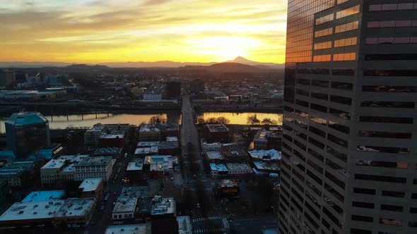 Sun Rising Behind Mt Hood in Downtown Portland