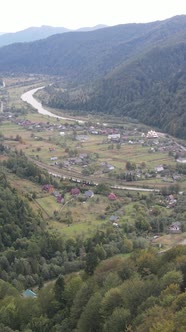 Vertical Video Village in the Carpathian Mountains in Autumn