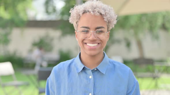 Portrait of Young African Woman Smiling at Camera