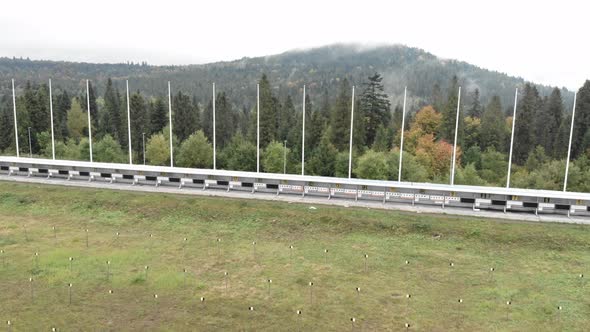 Biathlon sport training base with shooting range and sport lanes.