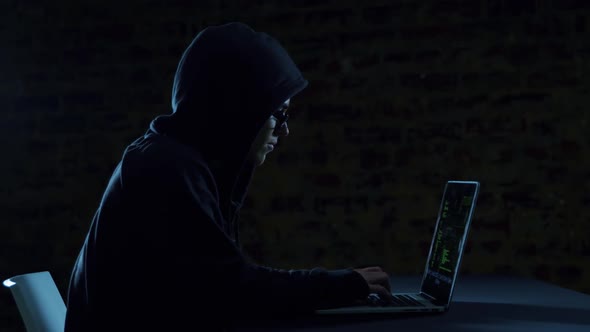 Hacker using laptop