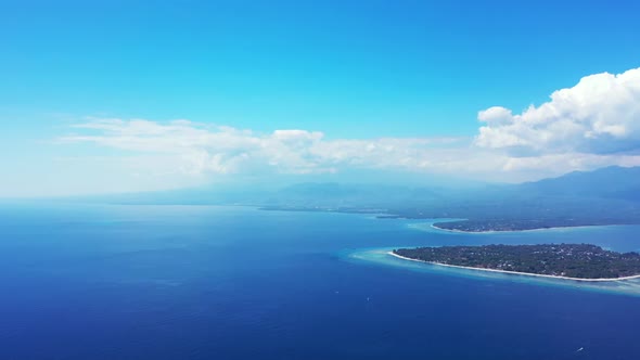 Aerial sky of perfect sea view beach wildlife by blue ocean with clean sandy background of a dayout 