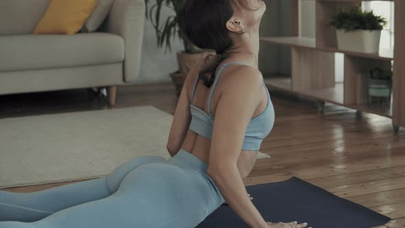 Woman Doing Yoga At Home