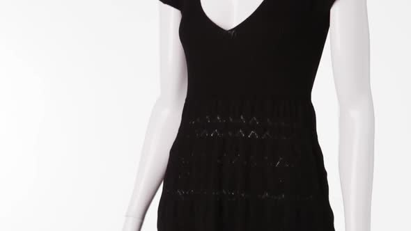 Black V-neck Dress on Mannequin.