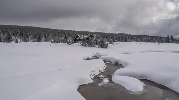 The Jizera stream, flowing through the Jizera Mountains in the Czech Republic. Winter season.