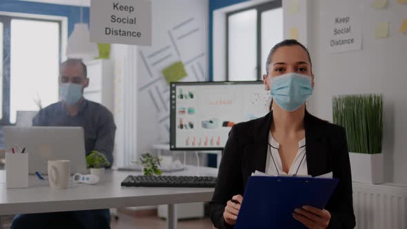 Pov of Business Woman with Medical Face Mask Working at Communication Project