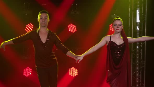 Young Couple of Dancers Dancing Ballroom Dance Elements