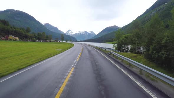 Driving a Car on a Road in Norway