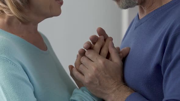 Elderly couple enjoying each other, beginning of relationship in adulthood