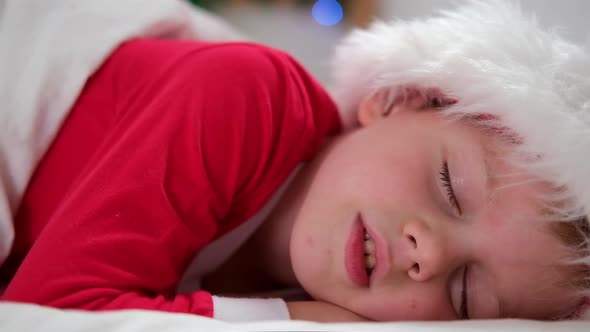 Child Sleeping Before Christmas