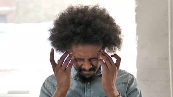 Headache, Stressed Young African Man with Pain in Head