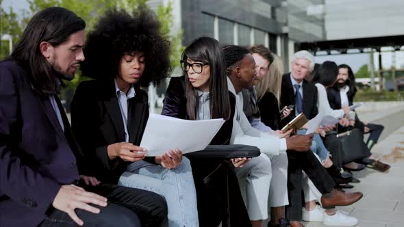 Multiracial business people working outdoor meeting outside the office - Entrepreneur team