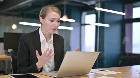 Hardworking Young Businesswoman Reacting To Failure on Laptop 