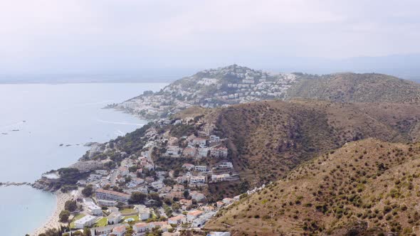 Aerial of Famous Coastal Mediterranean Town of Roses Spain